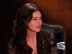 6883491_Monica_Bellucci_The_Beauty_and_a_mask.gif